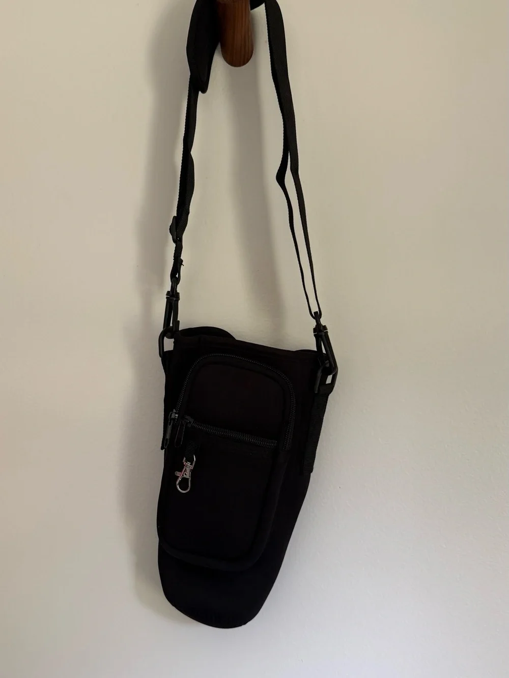 Black Crossbody Water bottle Sling Bag with zippered phone pocket and key ring